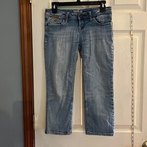 Xanadu jeans-size 5- Capri light wash slightly distressed. Gold bedazzlement.